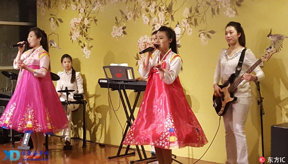 Waitresses from DPRK are singing in a North Korean restaurant in Beijing on Feb 12, 2017. [Photo: IC]